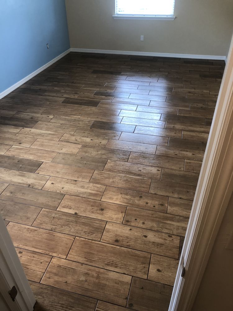 Renovated bathroom with new tile flooring